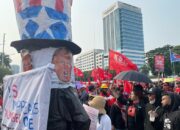 Ogoh-ogoh Muka Donald Trump Jadi Simbol Kritik di May Day Depan DPR